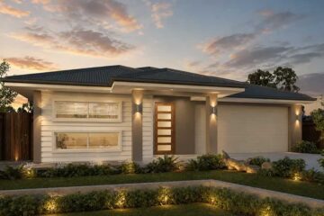 167-Plumbago-Place-Dakota-185-WIP - Fresh Homes Modern single-story house at dusk with landscaped front yard and warm exterior lights along the pathway and plants, two-car garage on the right.
