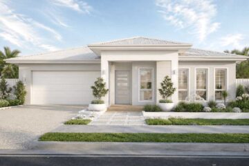 Modern white, single-story house with a two-car garage, front steps, and landscaped yard