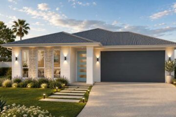 773-Cabana-Cresecent-Dakota-185 - Fresh Homes Modern single-story house with a gray metal roof, stone accent wall, and a two-car garage with exterior lighting at dusk.