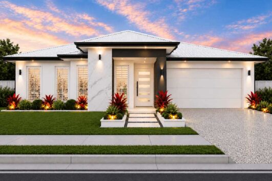 Modern single-story house with a white facade, front steps, and a two-car garage, lit at dusk with landscaped red-leaf plants and a dotted stone driveway.
